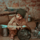 boy holding stock pot